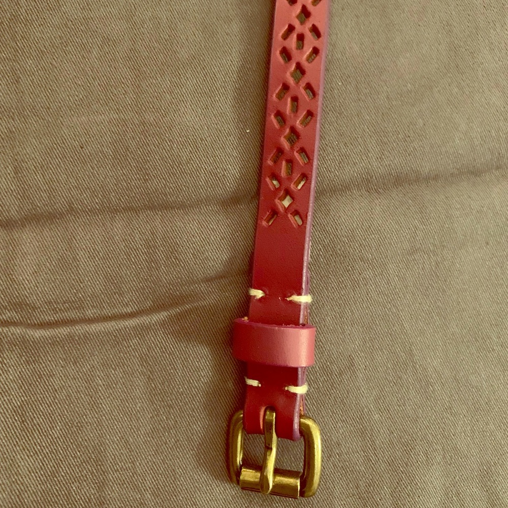 Pink skinny belt with gold buckle